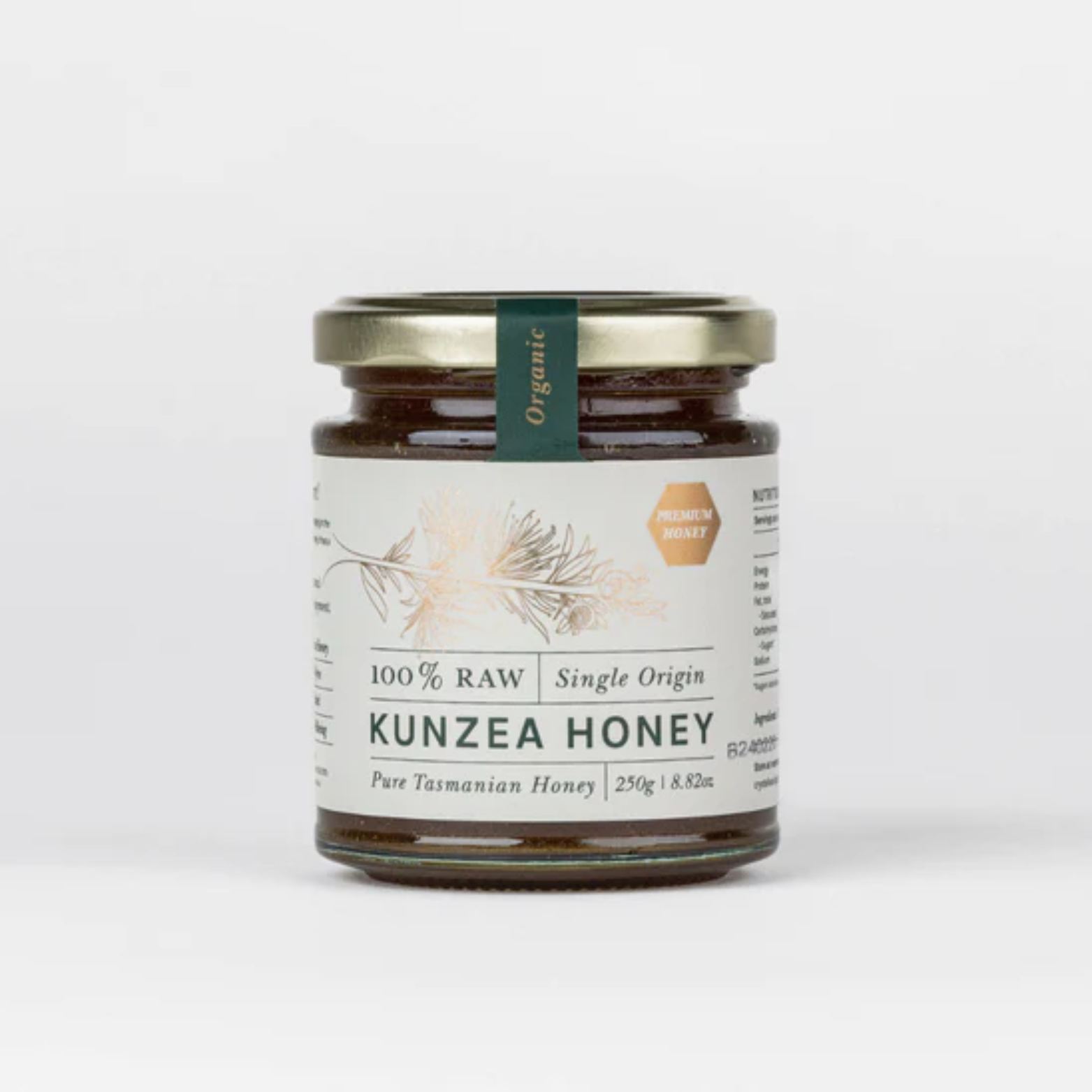 Jar of Kunzea Honey with a label on a white background 100% raw Single Origin Pure